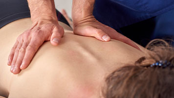 patient getting diversified chiropractic in Hayward CA
