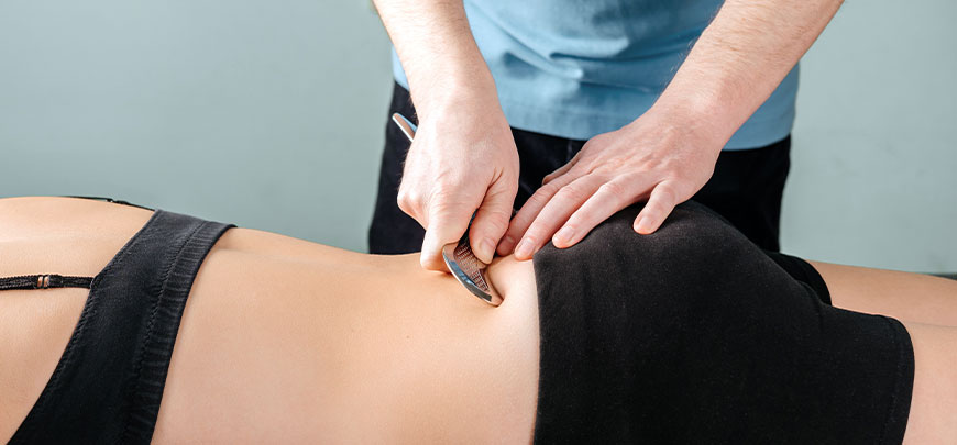 patient receiving graston chiropractic in Hayward
